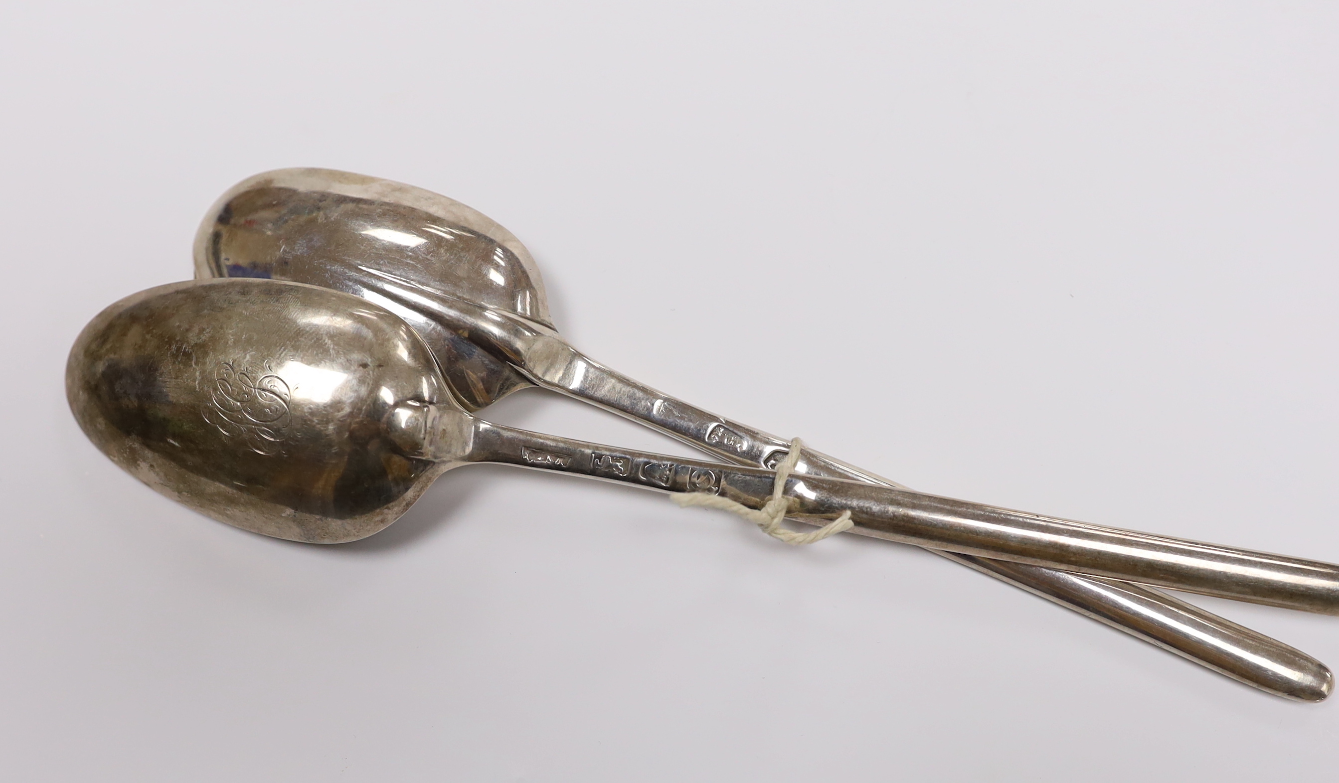 Two 18th century silver combination marrow scoop spoons, London, 1715 and London, 1771, the latter 23.3cm, 91 grams.